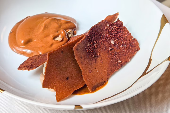 Trente-Trois' Nicolas Berger Madagascar chocolate pecan nut, white coffee, and cocoa nibs. Paris, France